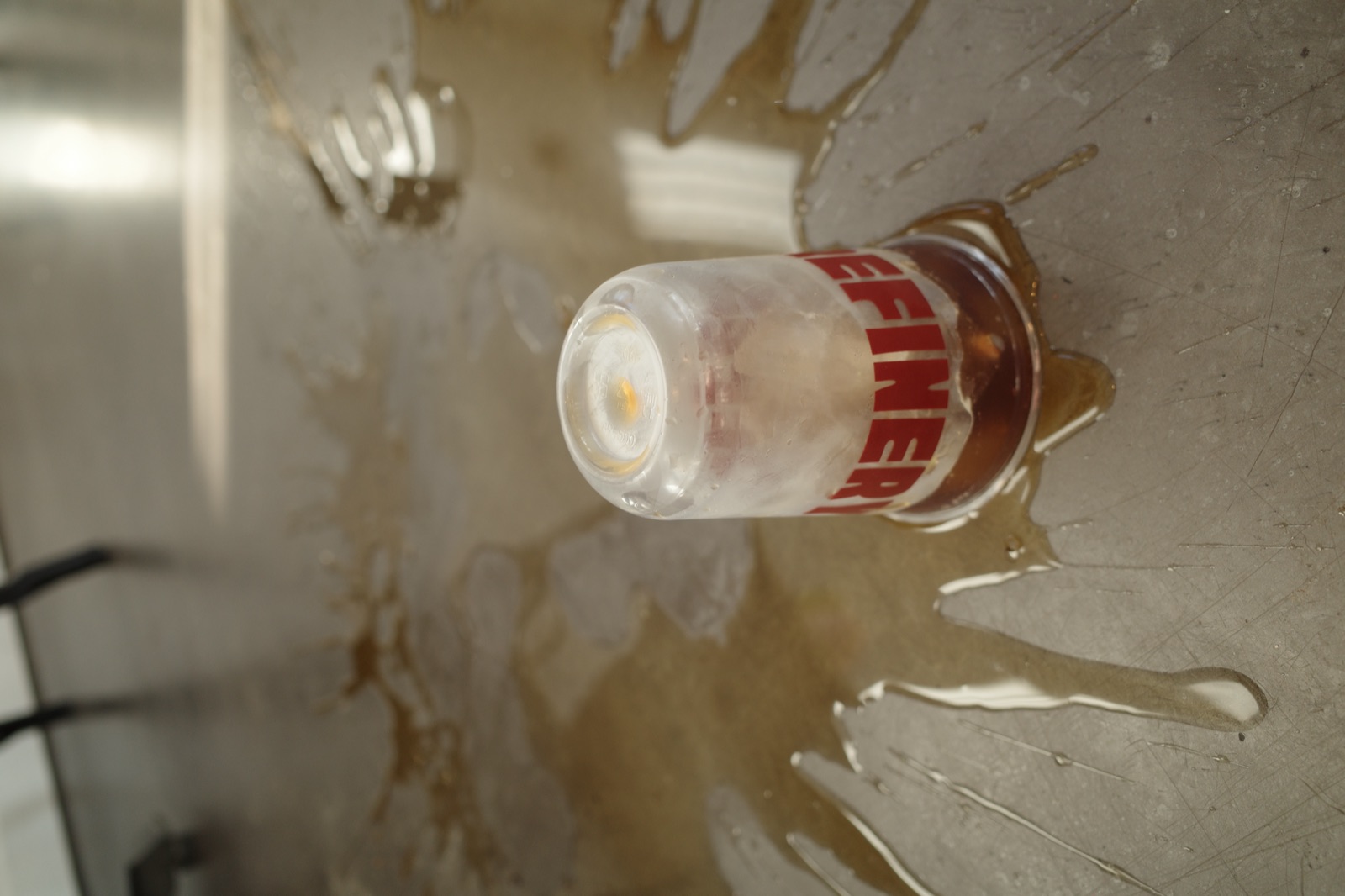Bottoms up — an empty Refinery Coffee cup upside down after bottomless brunch, Currumbin cafe